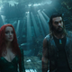 Aquaman and Mera are impressed.